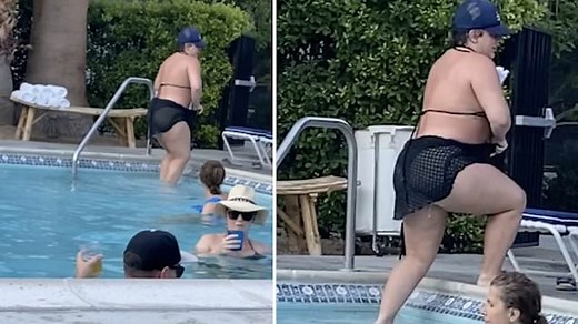 Aubrey O'Day appears unrecognizable as she climbs out of pool