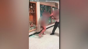 Student removes 'tight' pants during viral West Memphis school fight
