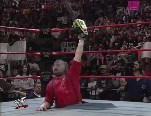 Cactus Jack and Chainsaw Charlie come through the ring. Raw Feb. 9, 1998 | Pro Wrestling Feed