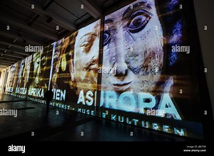Kassel, Germany. 8th June, 2017. A huge video installation at the Neue Neue Galerie, at the documenta 14 art exhibition in Kassel, Germany, 8 June 2017. The documenta 14 art exhibition officially opens on 10 June 2017. Photo: Boris Roessler/dpa/Alamy Live News Stock Photo - Alamy