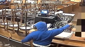 Wanted: Man caught on camera robbing midtown Outback restaurant