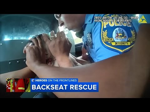 Philadelphia police officers perform CPR on infant during emergency response