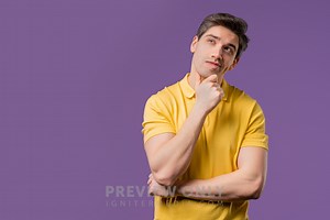 Thinking Around Man On Violet Background. Smart Student Guy Finding Answer Or Trying To Remember Wha - Stock Photos