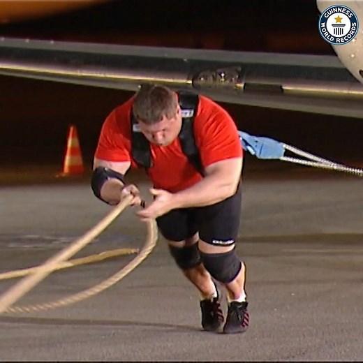 Fasten your seatbelts. Three powerful strongmen, one aircraft. Who can pull it in the fastest time? 🛩️💪 | Guinness World Records