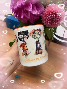 One of my ‘love is what’s left’ cups and some BEAUTIFUL flowers | Arna Baartz Artist
