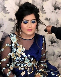 Doesn’t she look smoking hot in these sultry smokey eyes with rose pink lips ?🌟 Our stunner all dolled up to set the stage on fire. 🔥 MUA : @shreya_j_makeupandhair Bride : @thefashion_victim Outfit : @polkadotscouture_pallavi | Shreya J Makeup & Hair