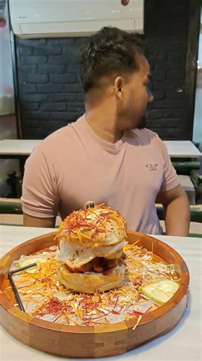 9.6K views · 83 reactions | #Burger_Challenge 99 Seconds  #Burger #Pizza #Rainy_RoofTop #Best_RoofTop | President Cafe rooftop restaurant | Facebook