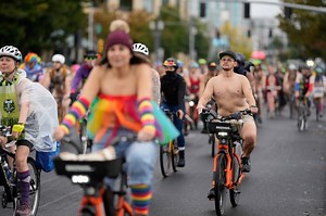 Naked bike riders demonstrate against federal troops in 'quintessentially Portland' protest