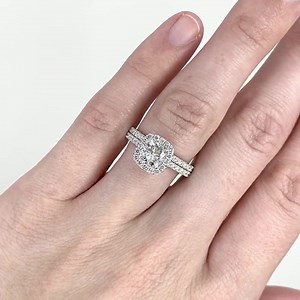 15 reactions | Sophie is our cushion halo engagement ring and is designed specifically for round or cushion-cut center stones. Here she is paired with a 6mm cushion-cut moissanite!  | Do Amore | Facebook