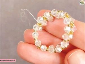 How to Make EASY Crystal Beaded Ring Tutorial 🛠 Materials 👇 🟣 Assorted beads and crystals. 🟣 Beading thread. 🟣 Pliers and cutters. 🟣 A creative spirit! | Wedding Decoration Ideas