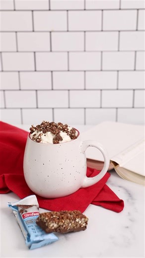 Break out the mugs for this delicious hot cocoa recipe (complete with a Crispy Chocolate Fudge Treat sprinkled on top!) Ingredients: 2 tbsp unsweetened cocoa powder 2 tbsp sweetener, to taste 2 tbsp non-fat dry milk powder Pinch of salt 1 cup of water SlimFast Delights Chocolate Fudge Treat for topping * Not a low-calorie food. See nutrition facts for sugar, calorie, and sat fat content. These statements have not been evaluated by the Food and Drug Administration. This product is not intended to