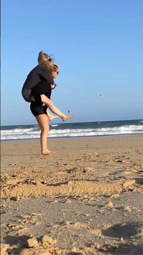 lesbian couple and lifting each other