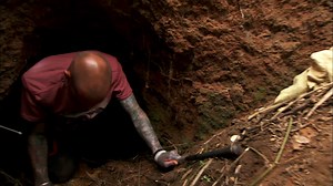 A snake relocator climbs down a narrow hole to find a python. See what he finds! #SnakeCity | National Geographic Animals