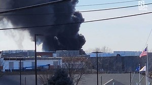 Fire sends up huge plumes of black smoke