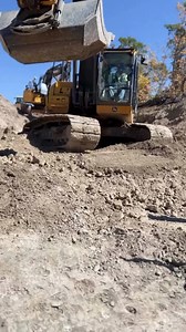5.6K views · 33 reactions |   Credit: Ryan H Goodfellow #rockstructures #rockstructuresutah #reels #excavator #rockwall #utilities #earthmover #deere | Equipment & Contracting | Facebook