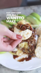 One of the easiest and tastiest appetizers. This Brie cheese appetizer has all of the fall flavors and is a crowd favorite ❤️ ✨INGREDIENTS ✨ * 1/2 cup brown sugar * 1⁄3 cup Kahlua coffee liqueur * 1 cup Chopped Pecans * 1 16 oz. round of brie cheese * 1 package water crackers * 2 Granny Smith apples, cored and sliced ✨ INSTRUCTION✨ 1. Preheat oven to 350 F 2. Arrange pecans on a baking sheet and toast in oven for 5-7 minutes or until golden brown. Remove from oven and set aside. 3. In medium ski