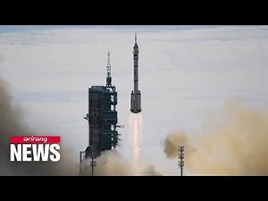 Astronauts enter space station core module after docking of Shenzhou-12
