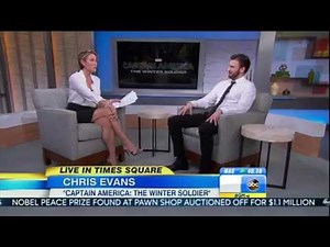 Amy Robach - leggy news reader - Good Morning America March 31, 2014