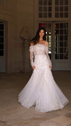 This ultra-feminine #MillaNova mermaid wedding dress features a semi-sheer bodice covered in light-catching beads and sequined appliques detailing allover with thin straps. Pair it with a detachable long sleeve bolero to personalise your bridal look. https://bit.ly/3DRfqQC #租婚紗 #婚紗租借 | Designer Bridal Room, Hong Kong | Facebook