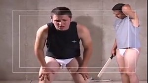 The two pledges take turns on each other under supervision.