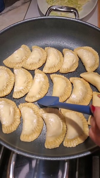 Homemade Potsticker Skins Filled With Mild Italian Sausage