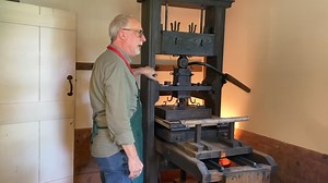 Printer-in-Residence Martin Antonetti gave a printing demonstration today and taught visitors some new lingo. Listen with the sound on to learn what "kissing the cheek" means in printing press terms. | Historic Deerfield
