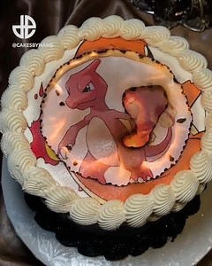 This cake reveals the entire evolution of Charizard when you burn it! | Dexerto