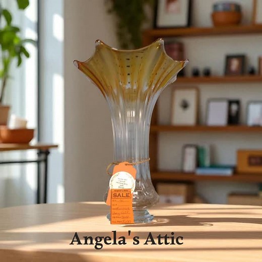 ✨ Carnival Glass Morning Glory Vase ✨ This 12” beauty glows in amber iridescence with elegant ruffled edges. No chips, no cracks — just pure vintage charm! 💸 Now $30 (was $50) 🪞 Dealer #41 📍 Angela’s Attic – 1020 Gardner St, South Beloit, IL 🕰 Open Sun–Fri 10–5 | Sat 10–6 Perfect for collectors, cottagecore lovers, or a dreamy summer shelf refresh. 🌼 #CarnivalGlass #MorningGloryVase #VintageVase #AngelasAttic #sale #SouthBeloitVintage #vintage #GlassCollector #CottagecoreFinds #VintageGlass