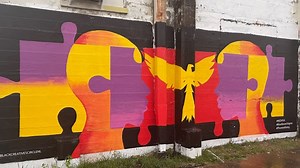 Black artists paint mural in downtown Monroe to raise awareness of mental illness