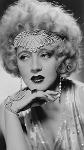 "The Girl with the Bee-Stung Lips" was the famous nickname for silent film star Mae Murray, an American actress and dancer known for her distinctive, pouty mouth, charismatic screen presence, and opulent lifestyle, though her life ended in poverty after the talkies,. This moniker, referencing her naturally full, alluring lips, became central to her exotic persona as a glamorous seductress and dancer, famous from the Ziegfeld Follies and films like The Merry Widow,. #maemurray #ZiegfeldFollies #s