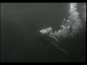 Hot vintage frogwoman attacked by crab monster. Attack Of The Crab Monsters.