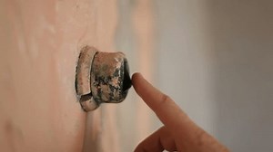 clip-1111309677-old-light-switch-on-wall-turning-lights