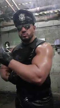 Leathered smoking Huge cigar and flex muscle!