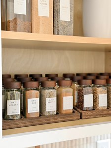 11K views · 41 reactions | This set includes 24 jars, 135 labels, and two containers to keep your cabinet organized  This setup makes cooking faster, cabinets calmer, and your kitchen feel instantly more put-together. #organizedhome #organizer #kitchenorganization #KitchenEssentials #amazonhomefinds | Everything Envy | Facebook