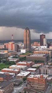 A quick rain shower passing by the Downtown Des Moines - DSM skyline. #catchdsm | Iowa Road Trip