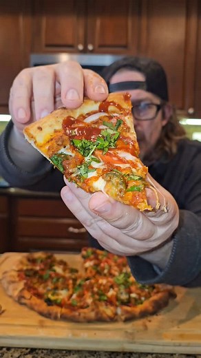🌮🍕Taco/pizza slayer!!!🎸🔥 We've been working on our pizza making skills using homemade fresh sour dough, and I've got to say my wife is kicking butt!!! Naturally, we had to make a taco inspired pizza , so we pulled out the @brandingironranch chicken taco meat to give it a spin. First a par bake, joey! Then some spicy tomato sauce and fresh mozz. Do we make the mozzarella in the back? 100%, joey. Then after a few minutes in the oven we add tomato, onion, jalapeno, the BIR chicken, and back in 
