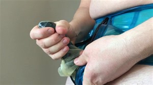 Cumming with layered LATEX cock sheath and pants