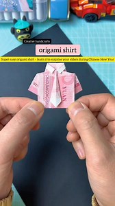 Beautiful origami shirt; learn how to make it so you can give your dad a red envelope for Chinese New Year! #Origami #NewYearCrafts #DIYCrafts #ParentChildCrafts #fblifestyles | hand made crafts for kids