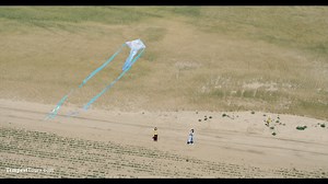 We had the pleasure of hosting two Chinese celebrities and their TV crew for a storm chase across Nebraska and Colorado. Here, the two stars take a break in a field while our staff waits for storms to develop. www.TempestTours.com | Tempest Tours
