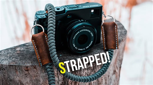 Snake knot camera strap with leather, paracord, and titanium