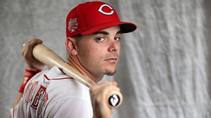 Scooter Gennett is back on the road with the Reds, but there's no timetable on his return