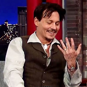Johnny Depp Explains Why He's Wearing the "Female Engagement Ring" He Gave Amber Heard