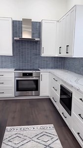 2.1K views · 18 reactions | When the backsplash matches the cabinets > : @dcasasremodeling #whitekitchen #bluekitchen #twotonedkitchen #kitchencabinets #kitchendesign | Fabuwood Cabinetry | Facebook