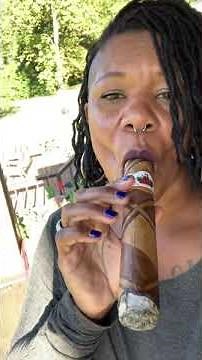 Lady cigar smoker