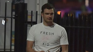 Watch moment ,Adam Johnson allegedly darts home, after prison release