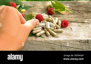 Raspberry leaf extract and supplements. Selective focus. Food.