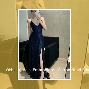 Flaunt your style with our stunning Women's Backless V-Neck Split...