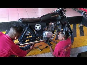 Escape Woolrich y Tubería en Honda Cafe Racer Style