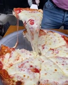 2.1K views · 144 reactions | The one and only double stacked pizza.. | East Village Pizza | Facebook
