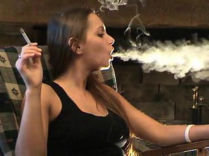 Beautiful woman chain smoking